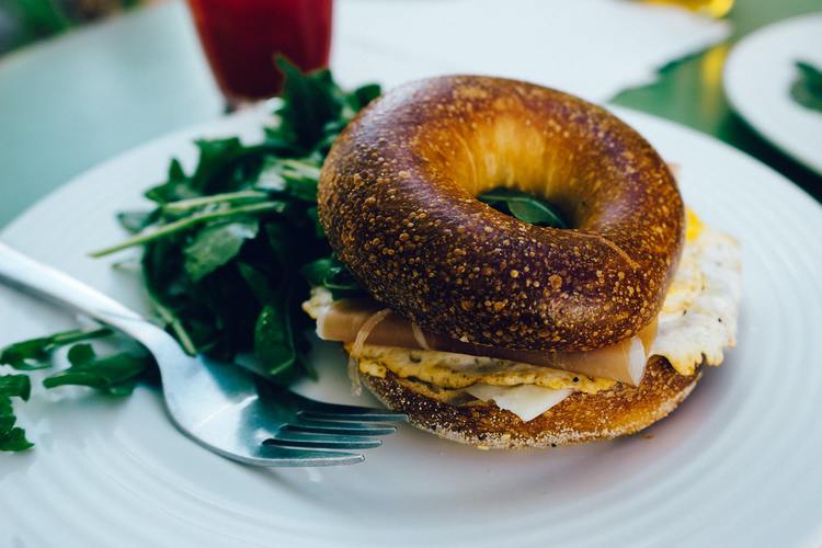 Ham, Cheese and Egg Bagel with Arugula Recipe