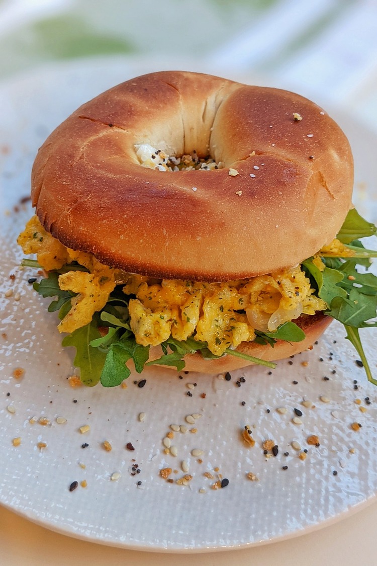Bagel Sandwich with Scrambled Eggs and Arugula Recipe